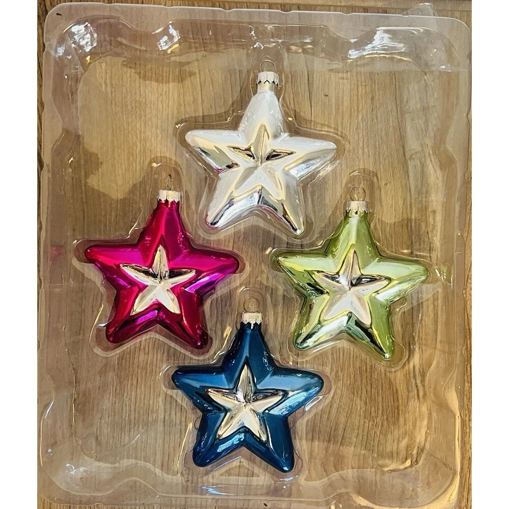 Handcrafted Glass Ornament Set features four star-shaped ornaments metallic
